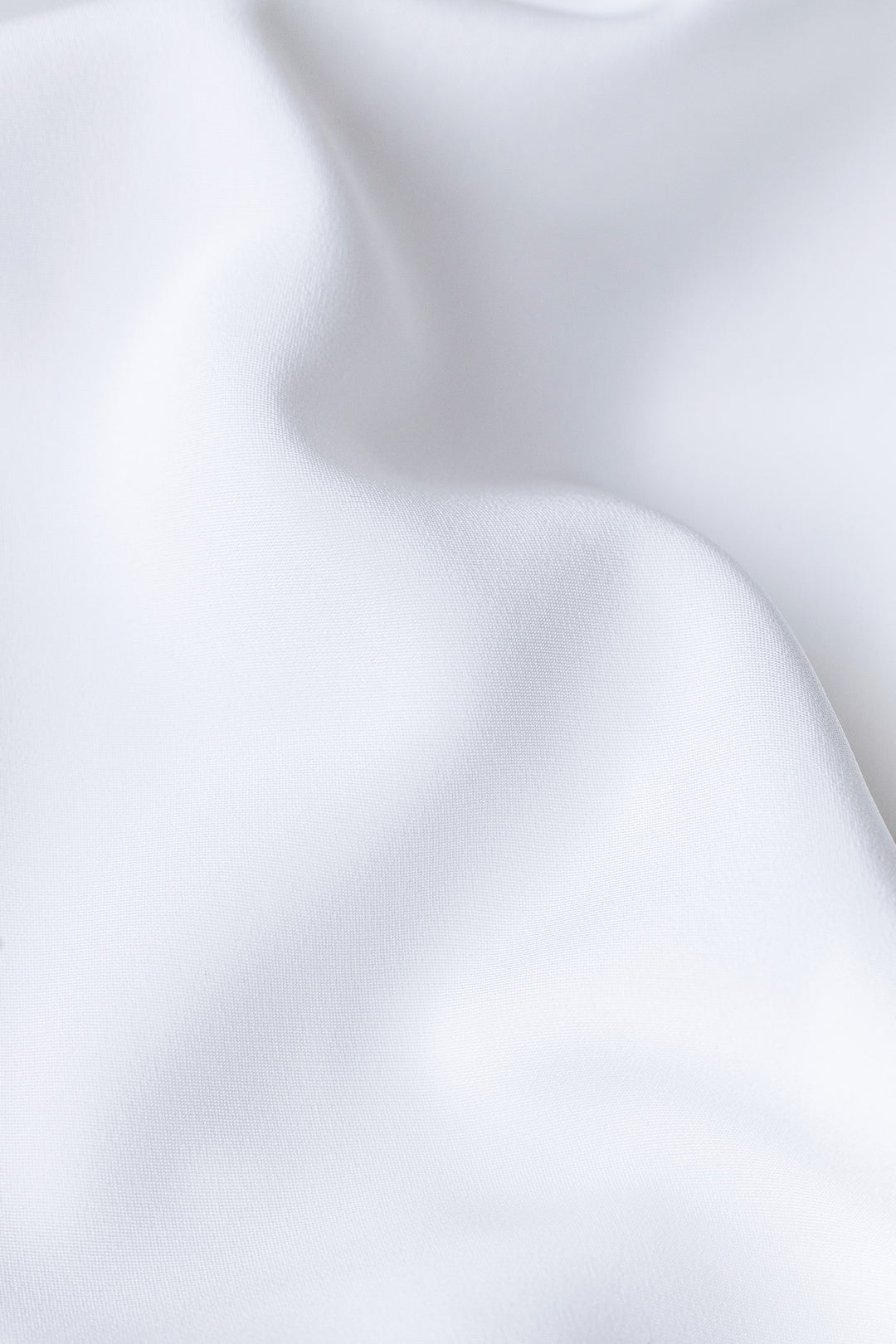 MELILOTUS WHITE SILK JACKET WITH DRAPED FRONT DETAIL