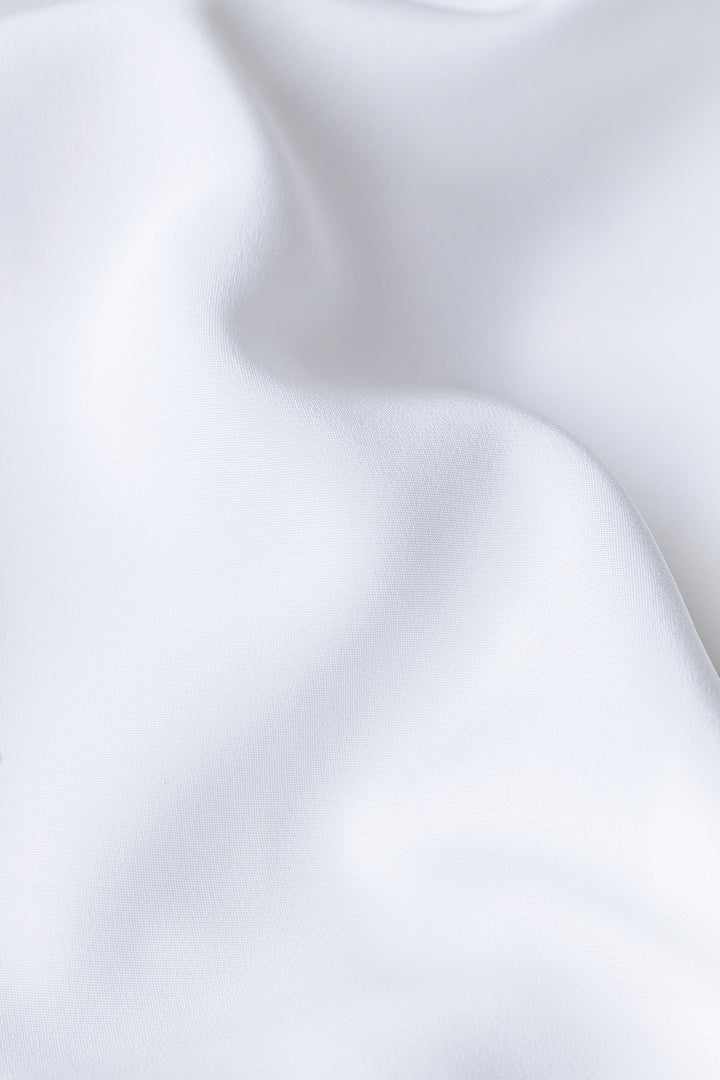 MELILOTUS WHITE SILK JACKET WITH DRAPED FRONT DETAIL