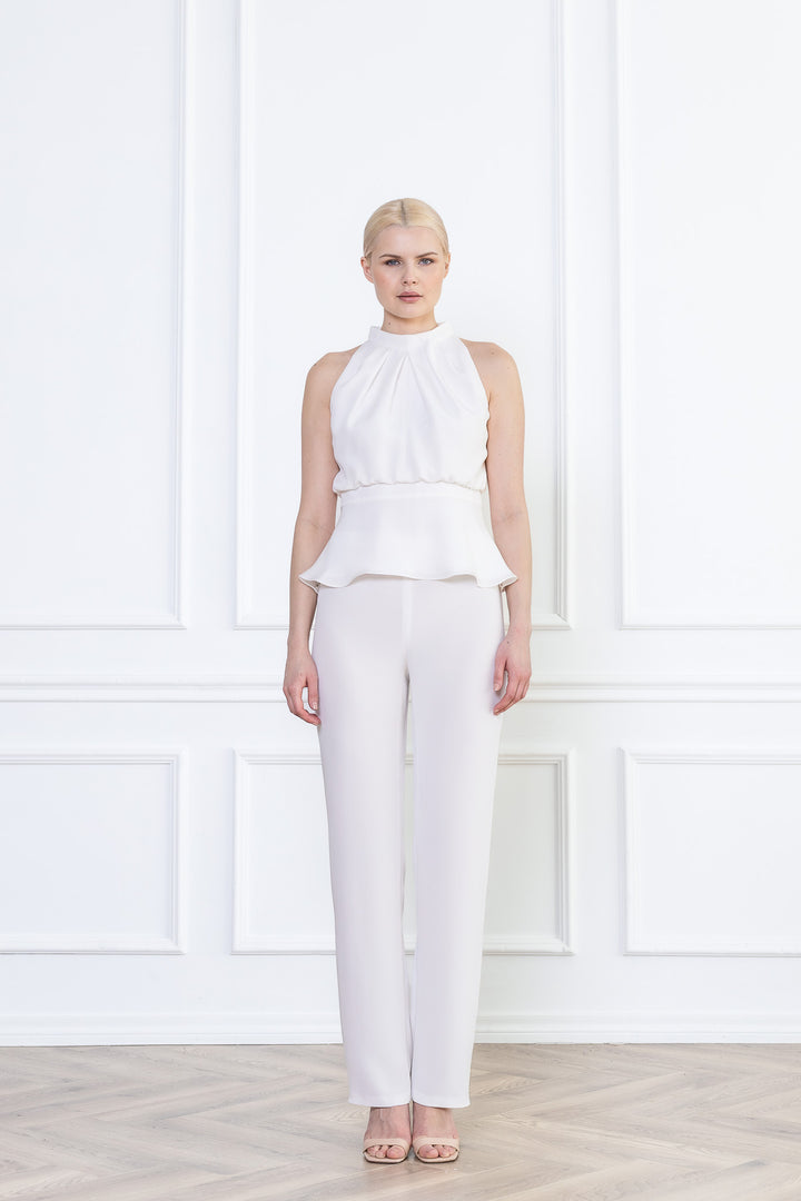 CLUSIA WHITE SILK HALTER NECK PEPLUM TOP WITH BOW DETAIL