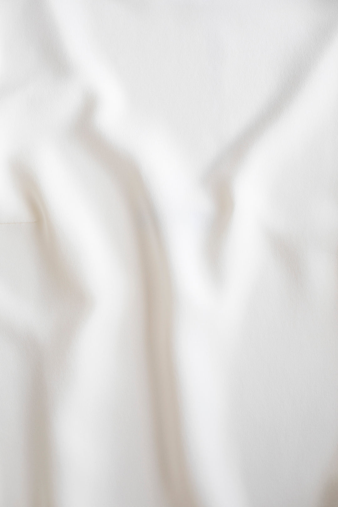 STELLARIA IVORY SILK WRAP BLOUSE