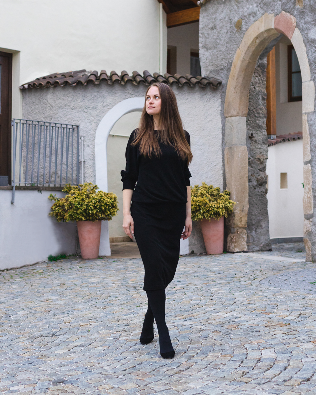 Fashion designer wearing little black dress