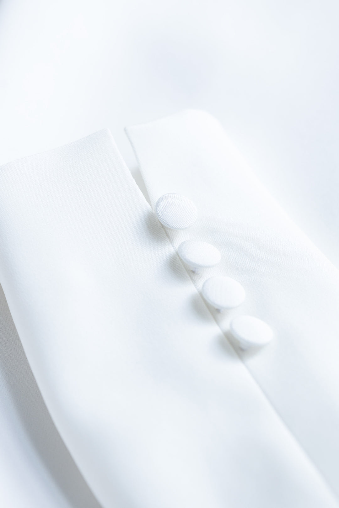 MELILOTUS WHITE SILK JACKET WITH DRAPED FRONT DETAIL