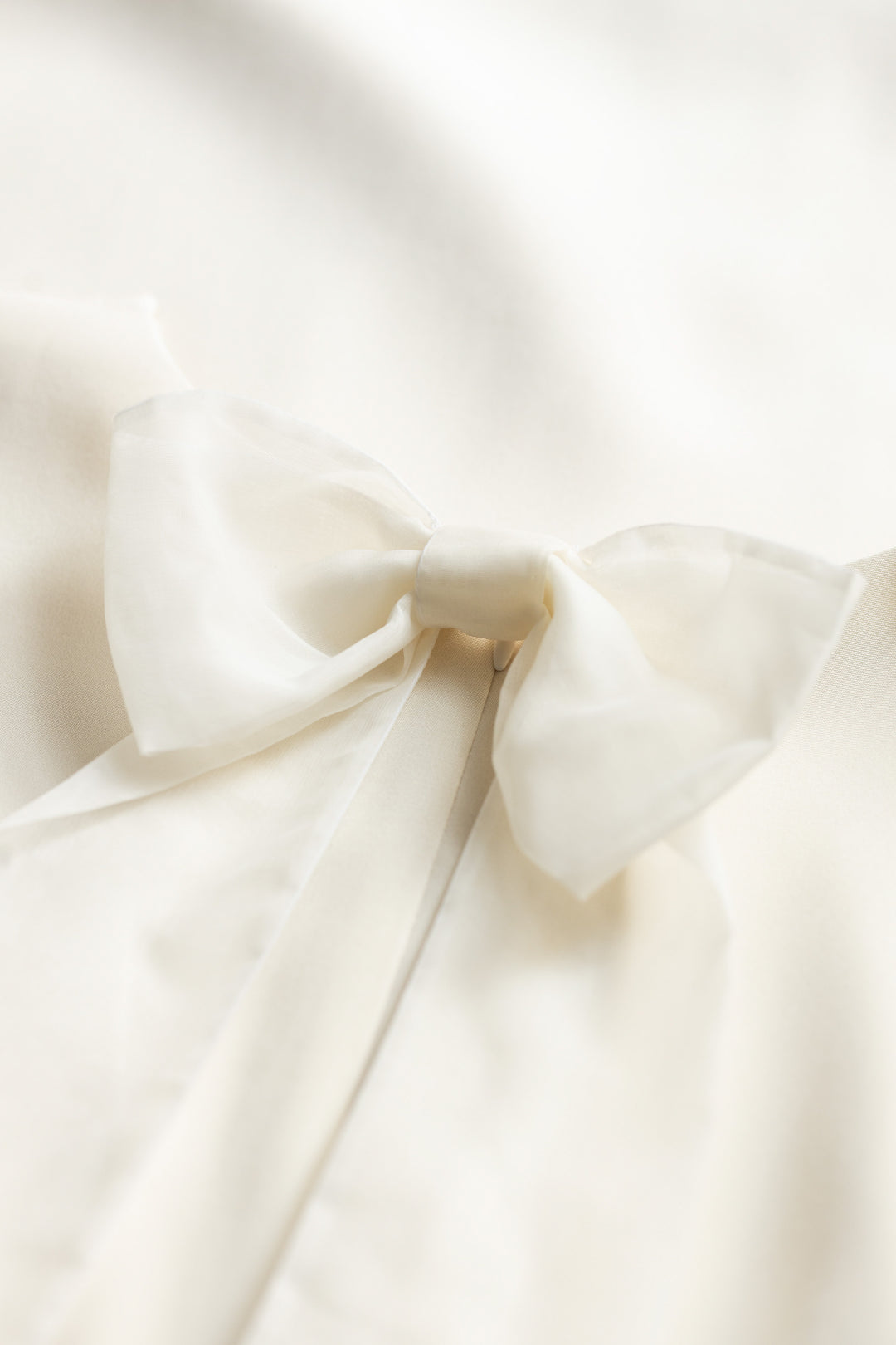 GARDENIA CREAM SILK T-SHIRT DRESS WITH BOW DETAIL