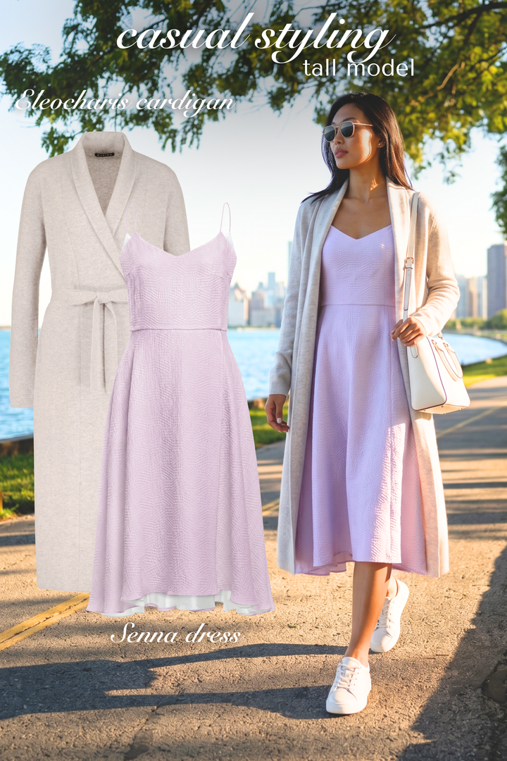 AI generated woman wearing a lavender silk a-line dress with a beige cashmere cardigan, sneakers and a cityscape in the background with product photos of the dress and cardigan next to her.