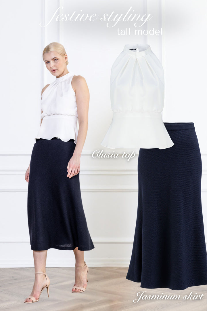 CLUSIA WHITE SILK HALTER NECK PEPLUM TOP WITH BOW DETAIL