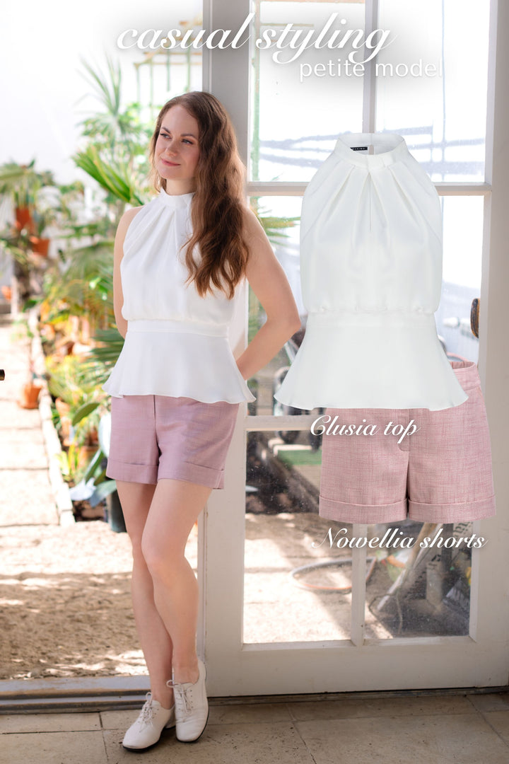 CLUSIA WHITE SILK HALTER NECK PEPLUM TOP WITH BOW DETAIL