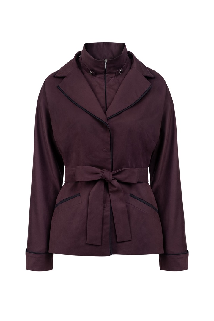 A dark plum purple belted jacket with black trim details, shown on a plain white background.