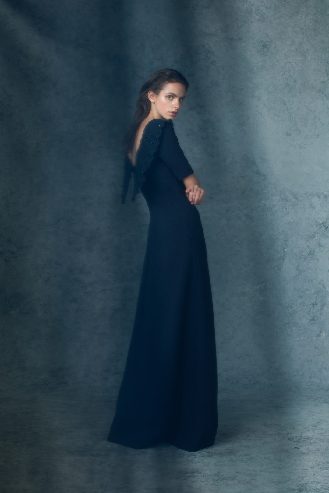 MUSELLA NAVY BLUE A-LINE GOWN WITH PLEATED DETAIL